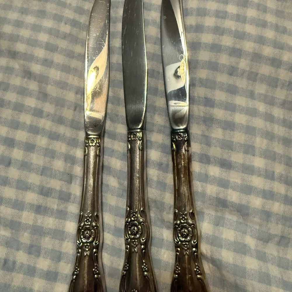 Ornate Silver-Plated Flatware Set - Elegant Floral Handle Design